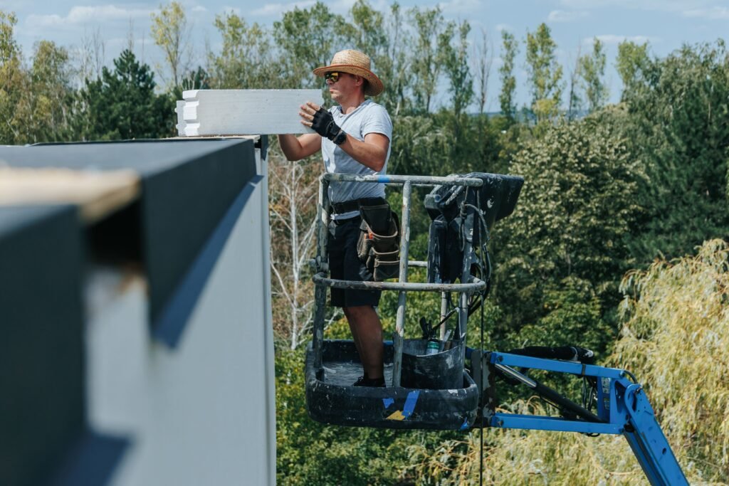 a-real-worker-on railing